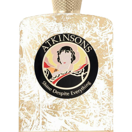 Luxury Atkinsons Shine Despite Everything decants on white background