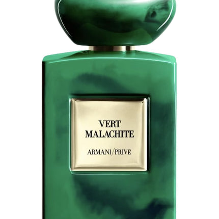Green marble-textured perfume bottle with gold label on a white background