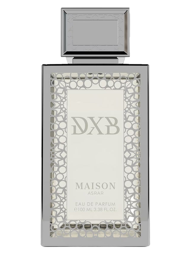 Silver perfume bottle with intricate design and 'DXB' branding on a white background