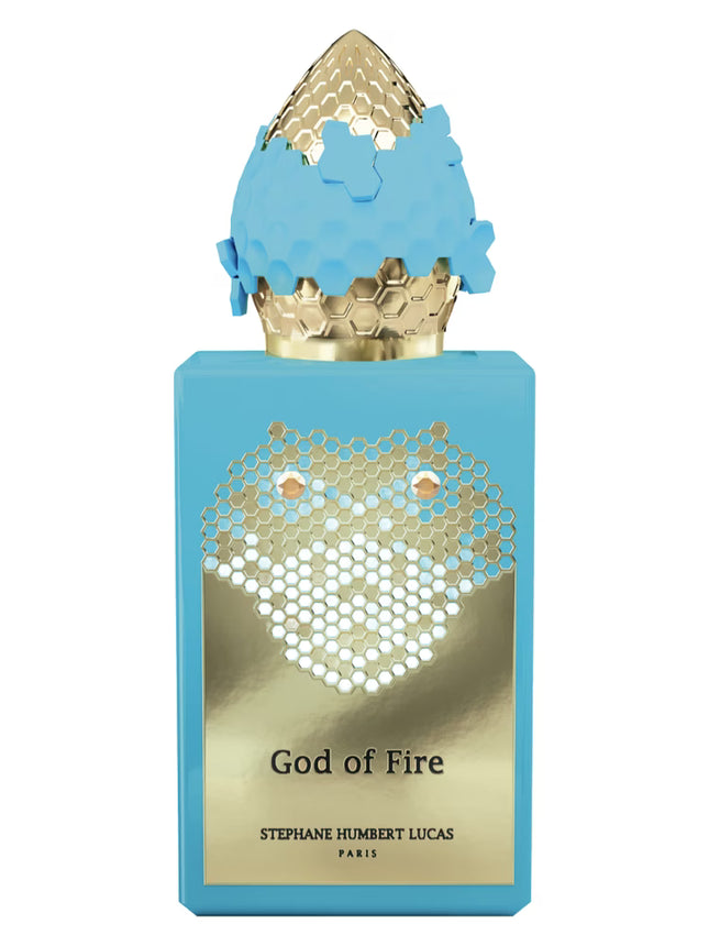 Perfume bottle labeled 'God of Fire' by Stephane Humbert Lucas on a white background