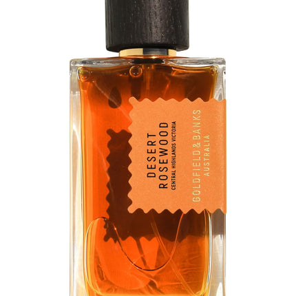 Perfume bottle labeled 'Desert Rosewood' by Goldfield & Banks on a white background