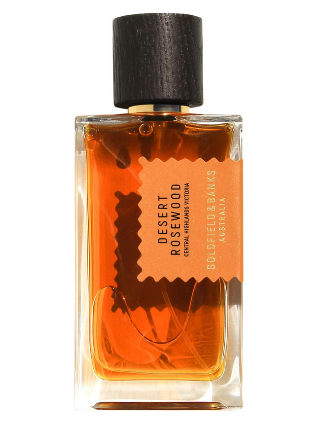 Perfume bottle labeled 'Desert Rosewood' by Goldfield & Banks on a white background