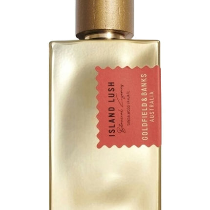 Gold perfume bottle with a red label on a white background