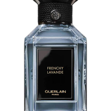 Guerlain perfume bottle with black cap on a white background