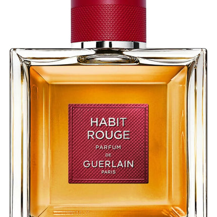 Guerlain Habit Rouge perfume bottle with red cap on a white background