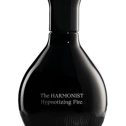 Black perfume bottle with 'The Harmonist Hypnotizing Fire' text on a white background