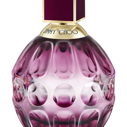 Purple perfume bottle with gold cap on a white background