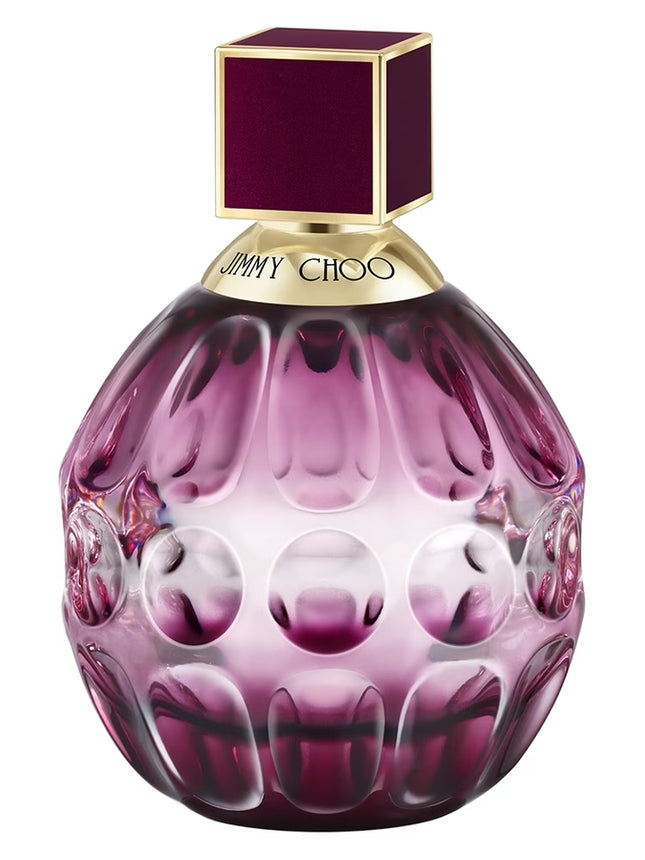 Purple perfume bottle with gold cap on a white background