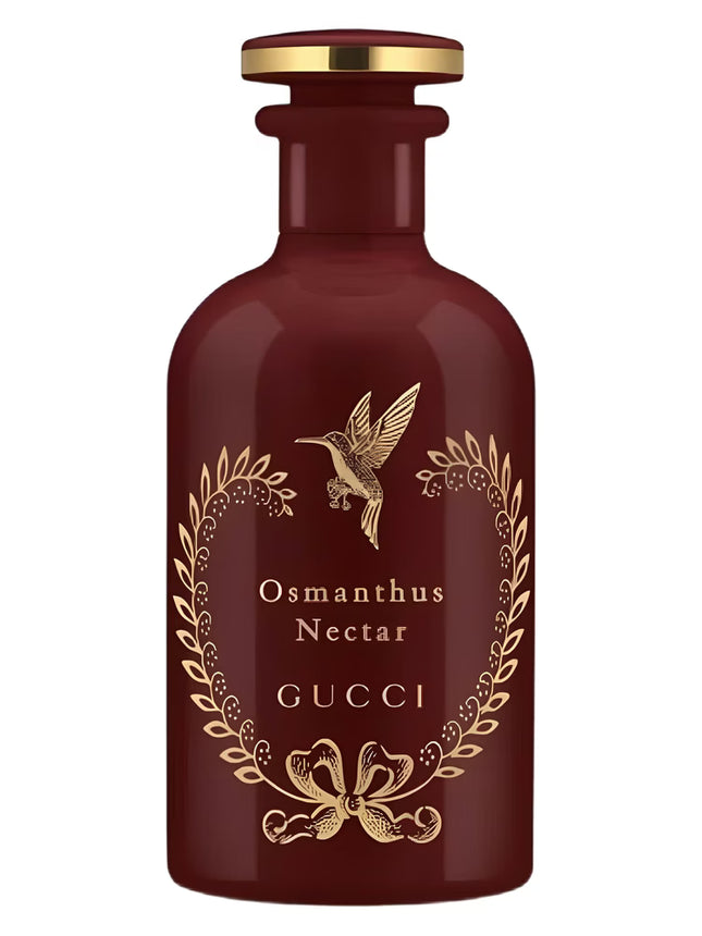 Gucci Osmanthus Nectar perfume bottle with gold accents on a white background