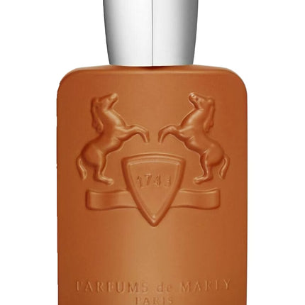 Brown perfume bottle with silver cap on a white background