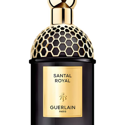 Guerlain Santal Royal perfume bottle with gold cap and label on a white background