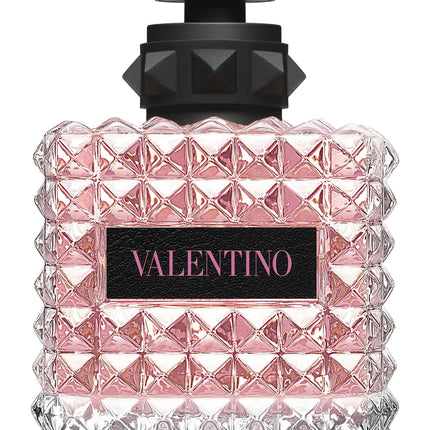 Valentino perfume bottle with pink and clear design on a white background