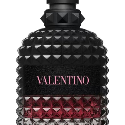 Valentino perfume bottle with black, red, and gray design on a white background