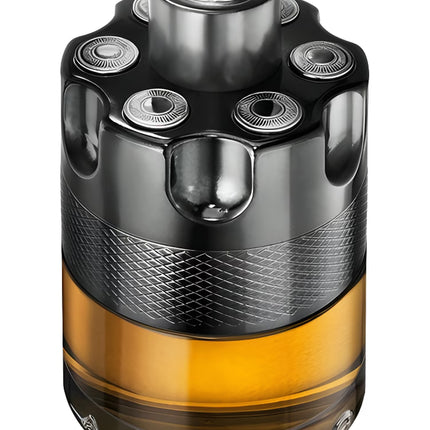 Shiny metallic and amber-colored cylindrical object with intricate design on a white background