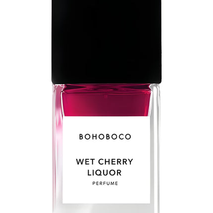 Bohoboco Wet Cherry Liquor perfume bottle with black cap and pink gradient.