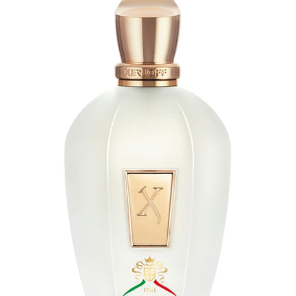 Perfume bottle with gold cap and NUXOS logo on a white background