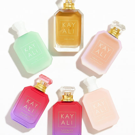 Set of Kay Ali perfume bottles in various colors on a white background