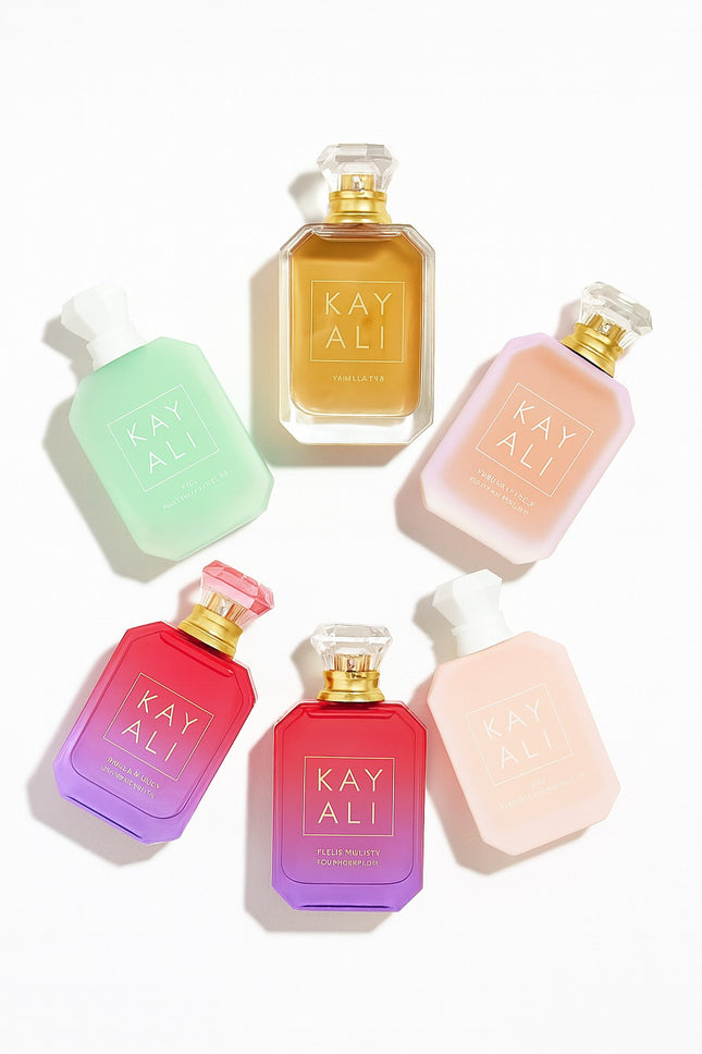 Set of Kay Ali perfume bottles in various colors on a white background