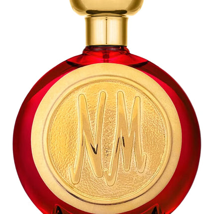 Red perfume bottle with gold cap and 'NM' logo on a white background